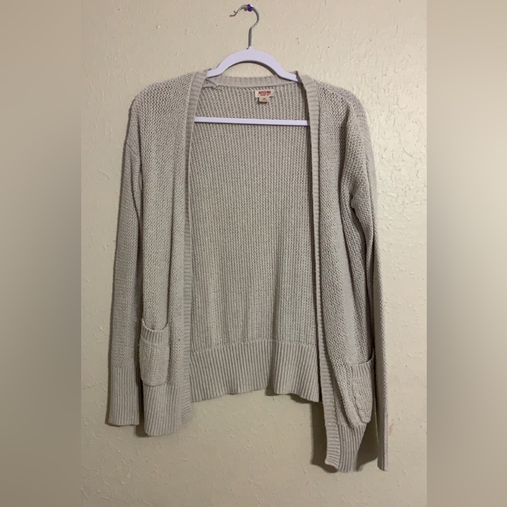 A cute fashionable cream cardigan